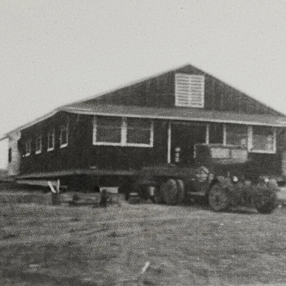 The 1947 church building being moved to the present site